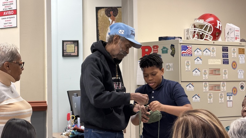 students on the bus , table and with seniors