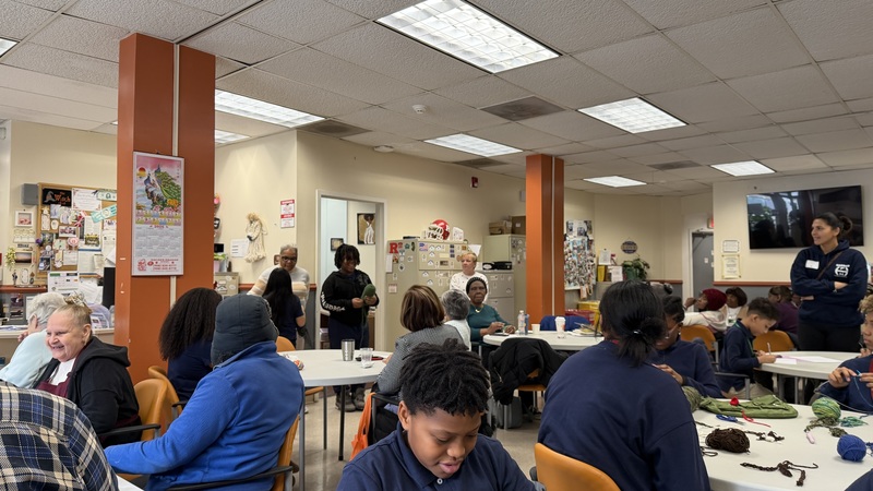 students on the bus , table and with seniors