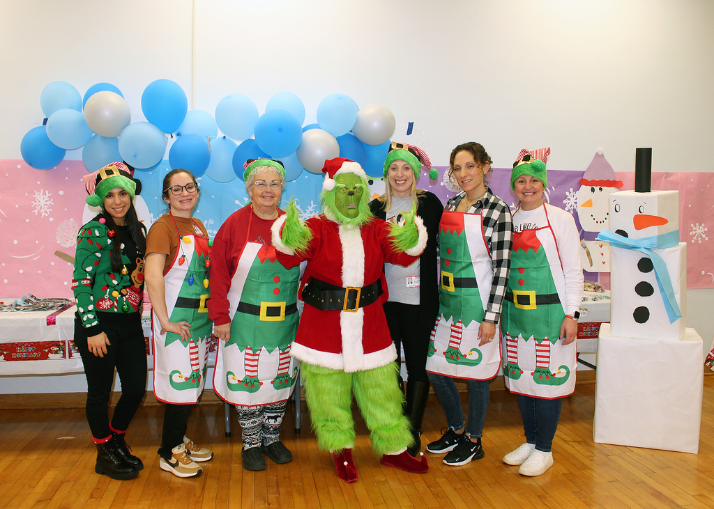 VEPTO volunteers with Grinch
