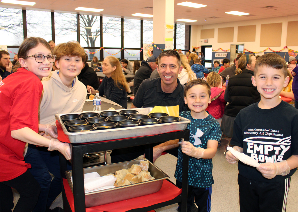 Students serving soup