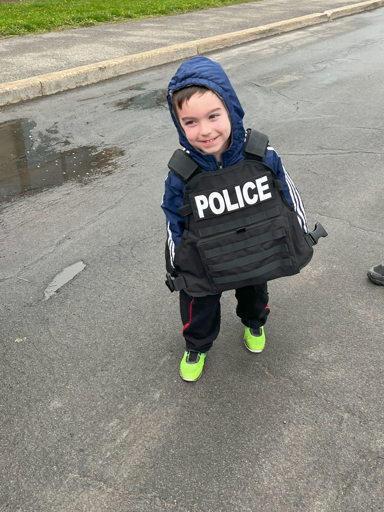 Student wearing a police vest