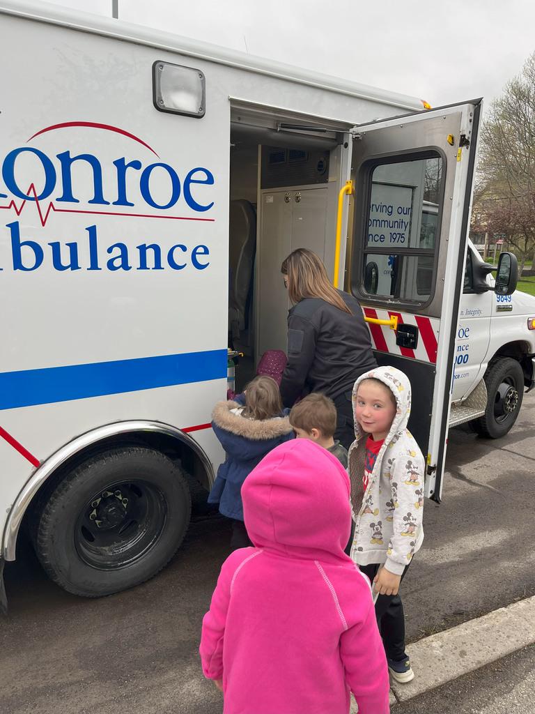 Students getting a tour of ambulance