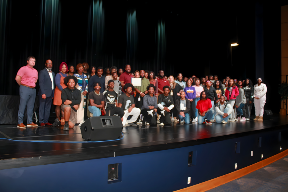 Student receives certificate