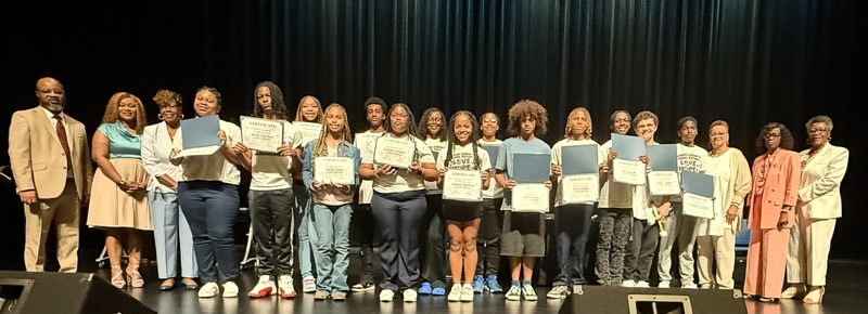 Student receives certificate