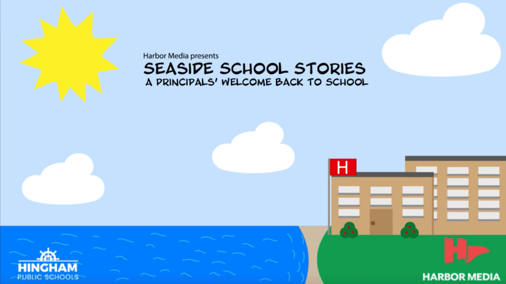 seaside school stories header image. clear blue sky with sun in the corner with a school building next to an ocean.