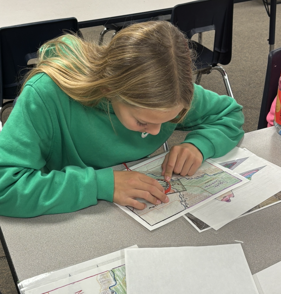 students working with a compass on orientation skills