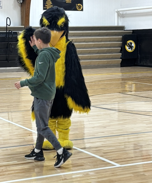 student receiving their award