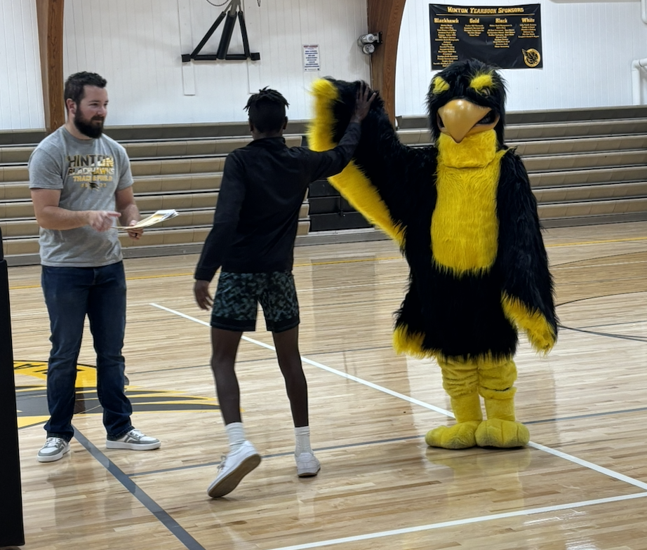 student receiving their award
