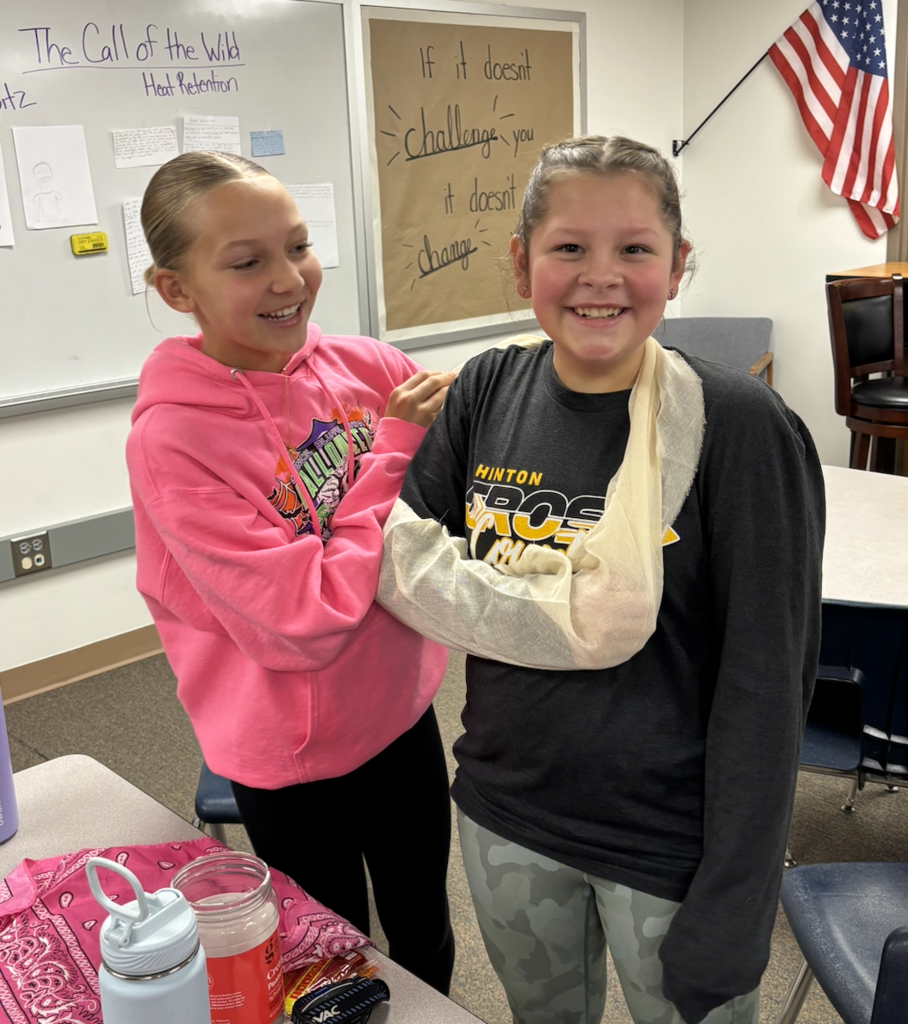 students practicing first aid