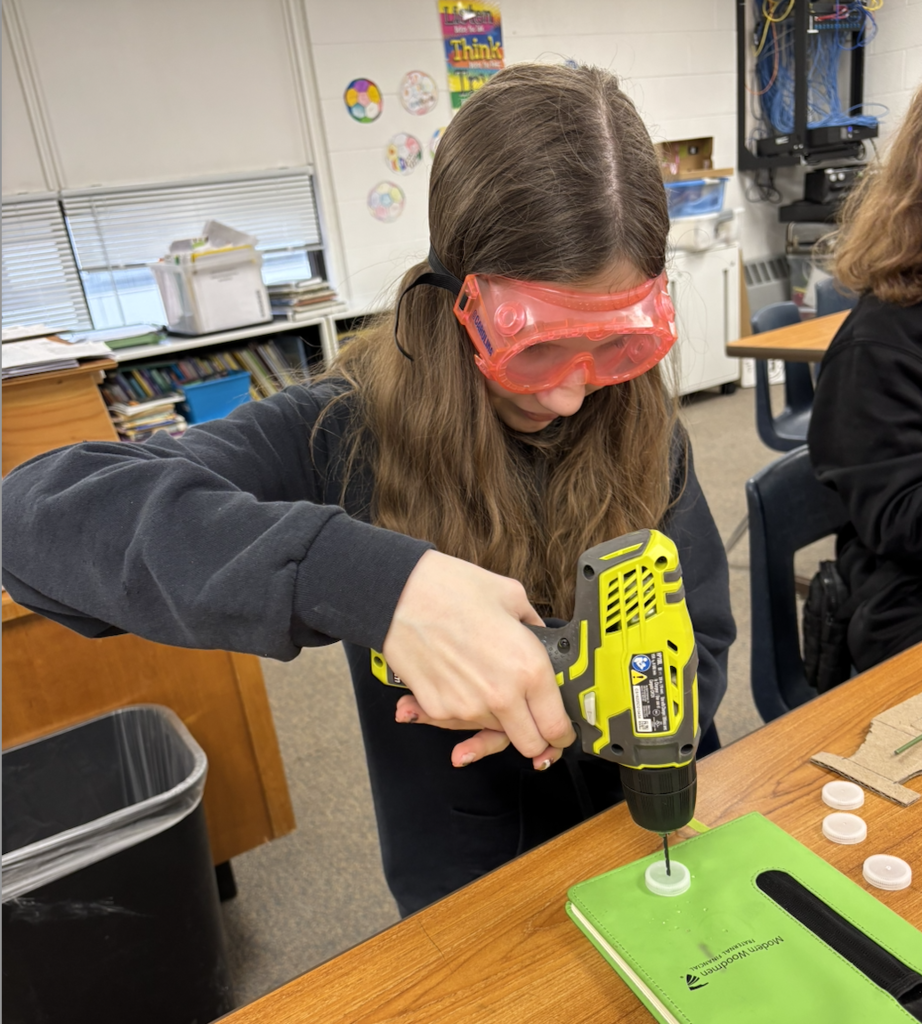drilling holes in the wheels