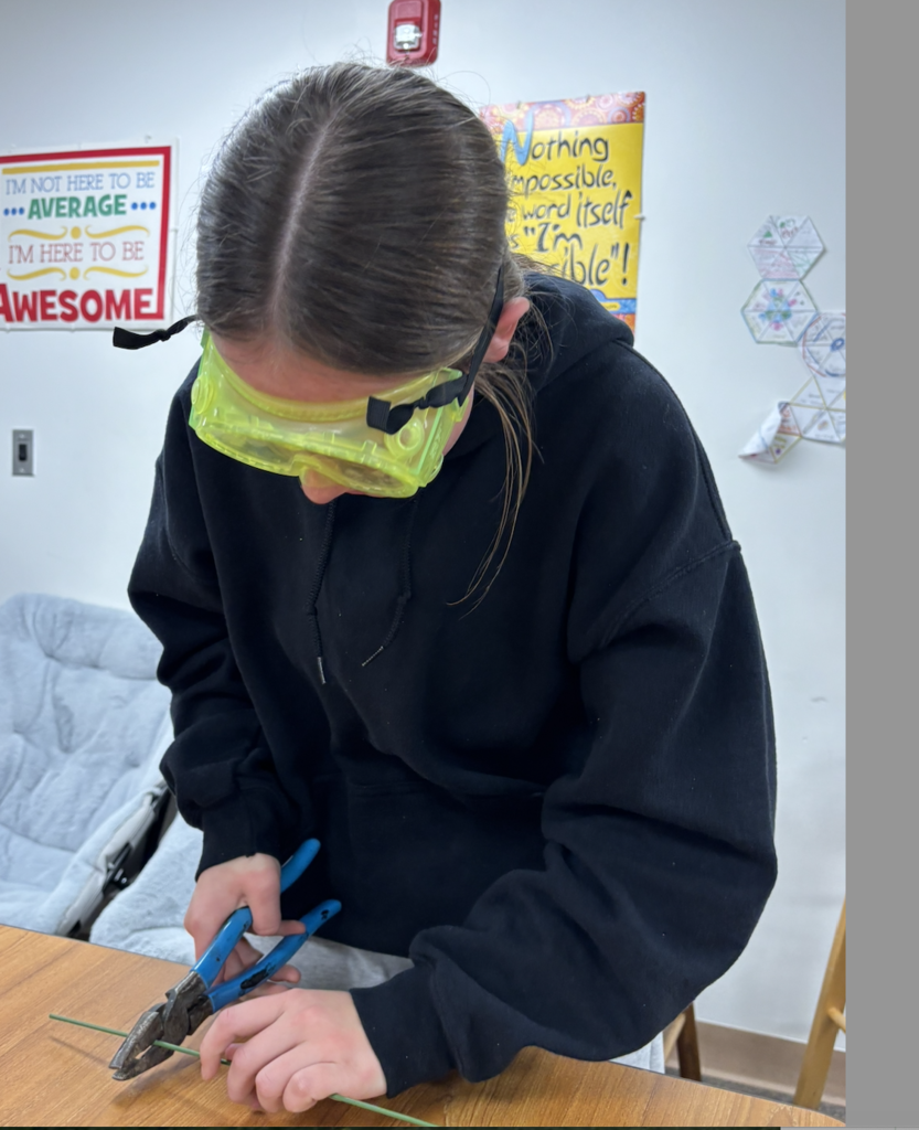 cutting metal stakes for the axles