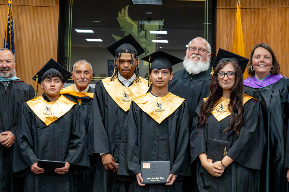 Alt school Summer graduates and Members of the HMS School Board during the Summer Graduation ceremony