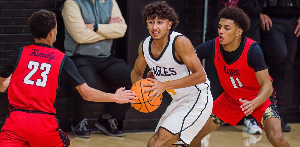 three basketball players