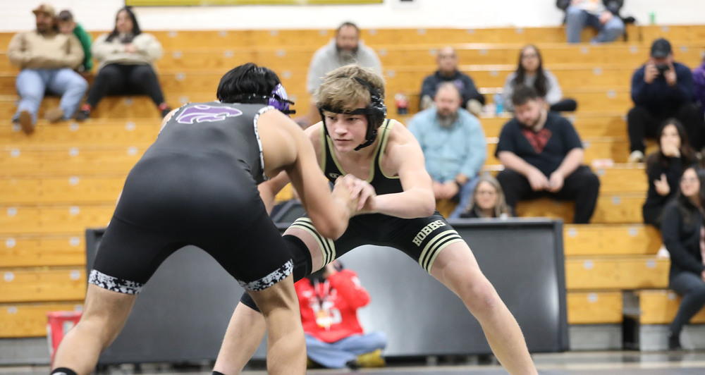 two wrestlers in duel