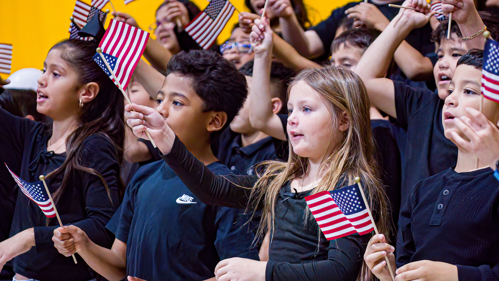 kids waving flags