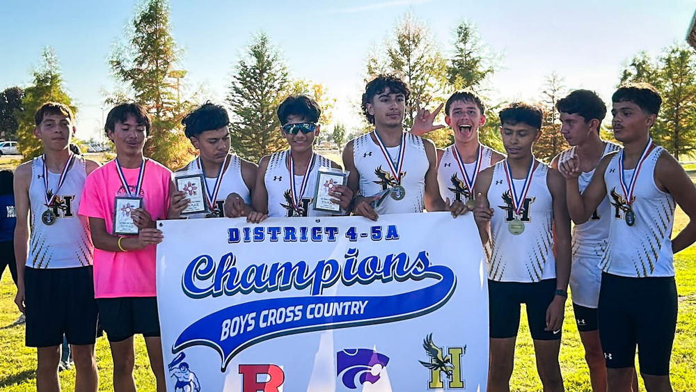 xc runners with banner