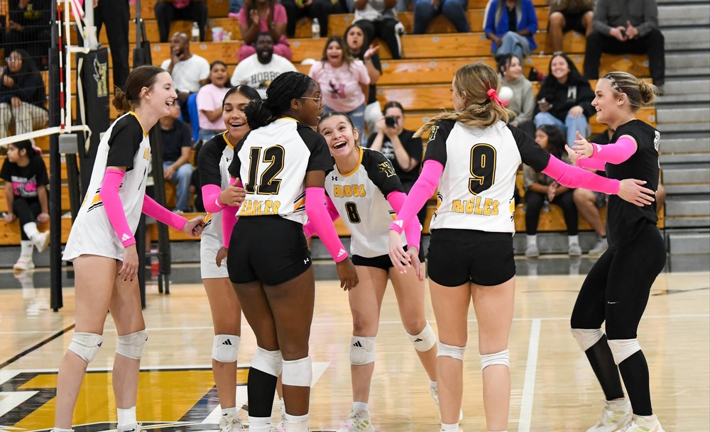 volleyball players celebrating win