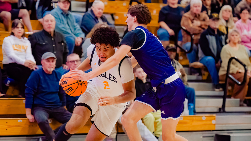 two basketball players on court