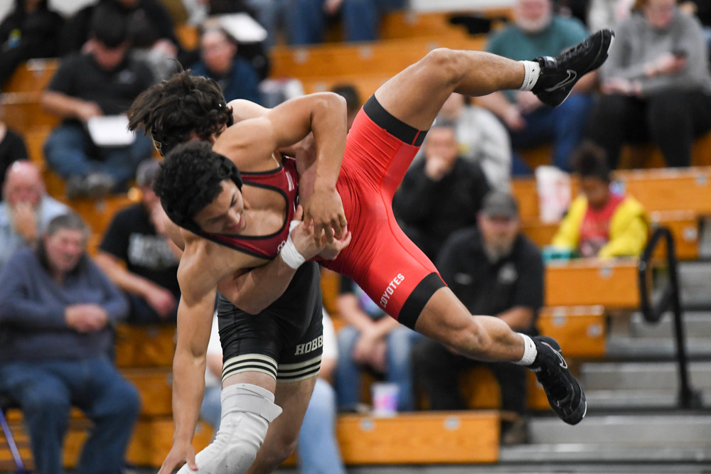 two wrestlers on mat