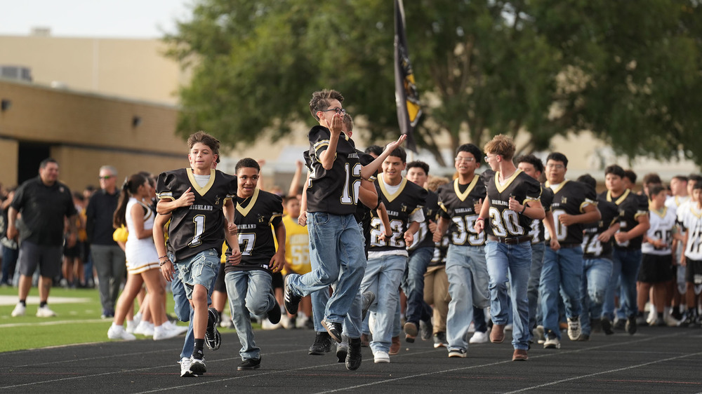 middle school boys team cheering