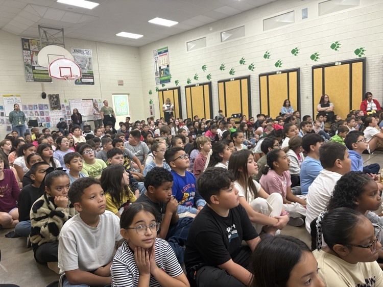 kids watching fire safety presentation