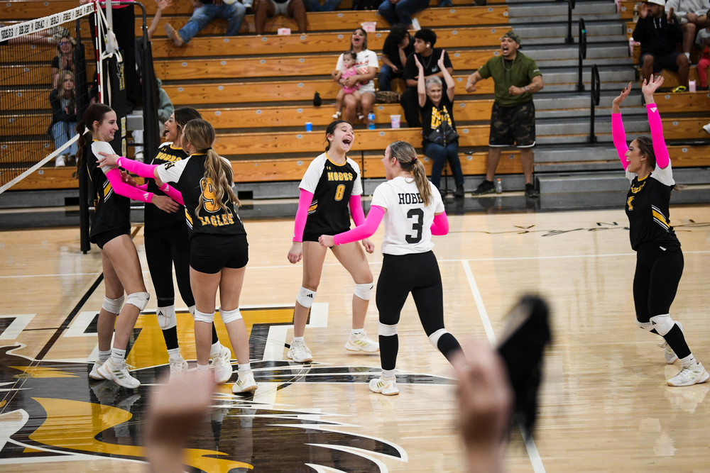 volleyball girls celebrate win