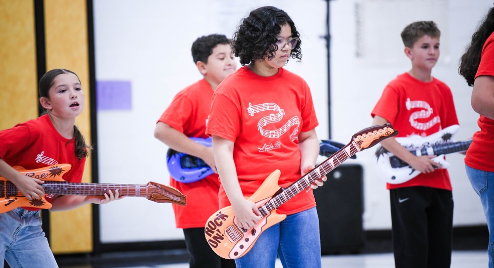 kids with air guitars