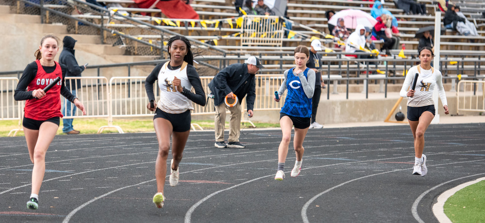 girls running on track