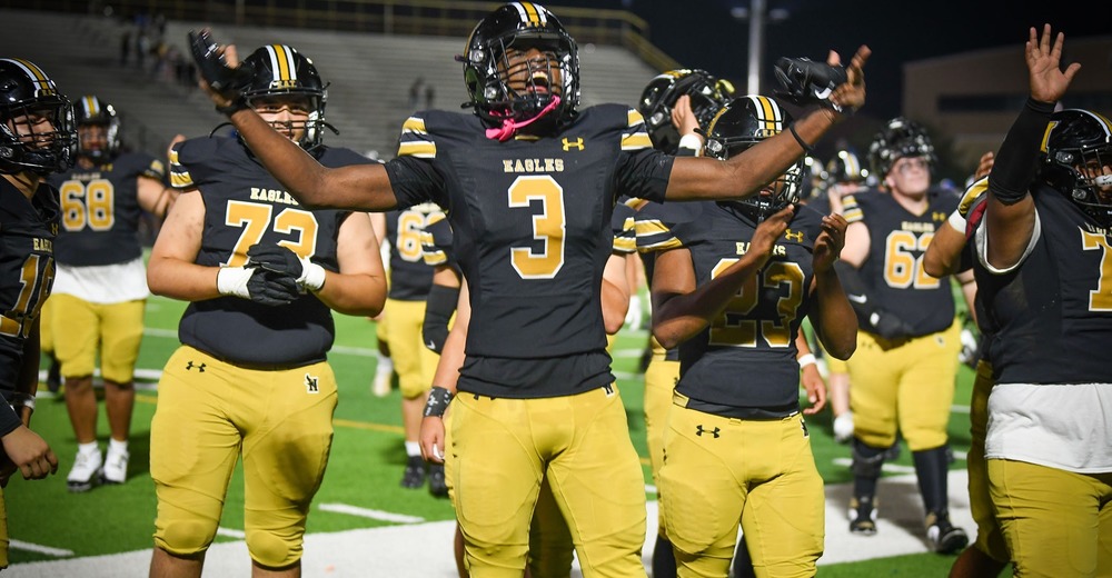 football players celebrating win