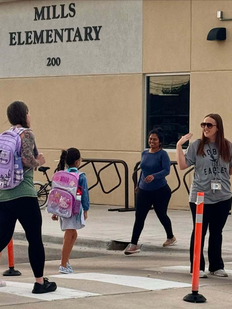 parents in crosswalk