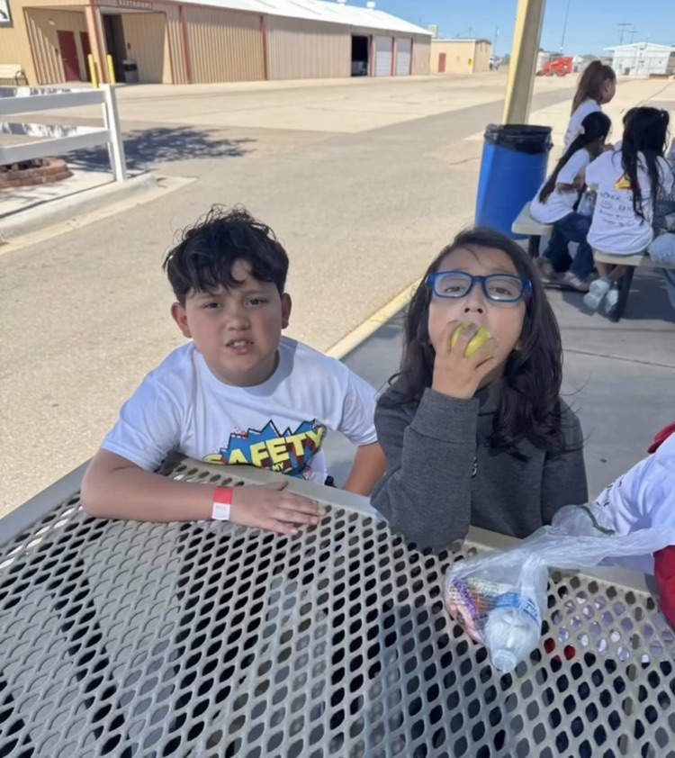 kids sitting at a table