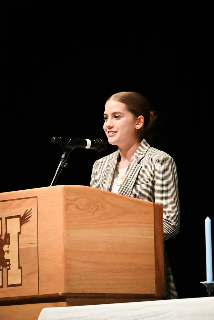 student speaking at podium