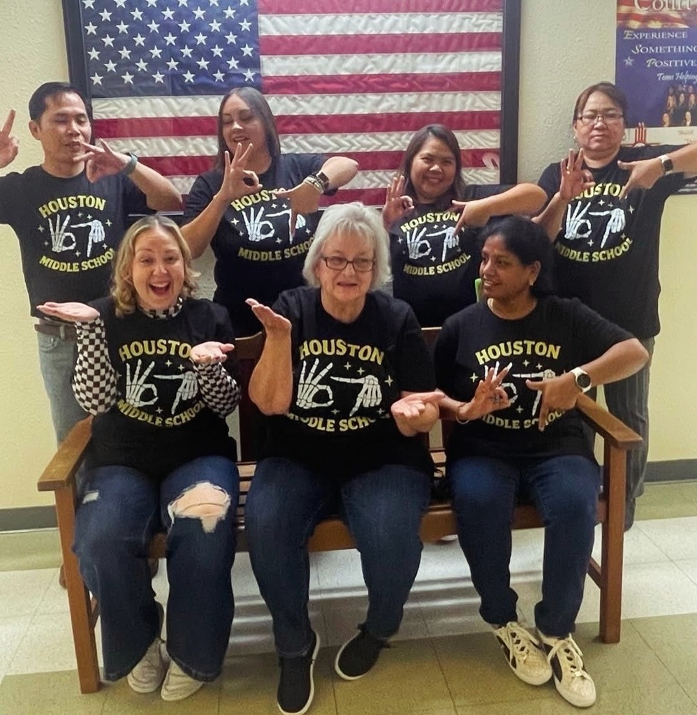 teachers making hand signs