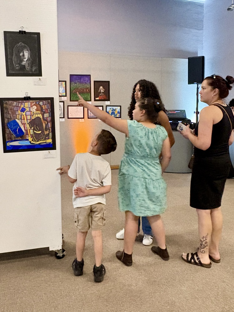 kids looking at art