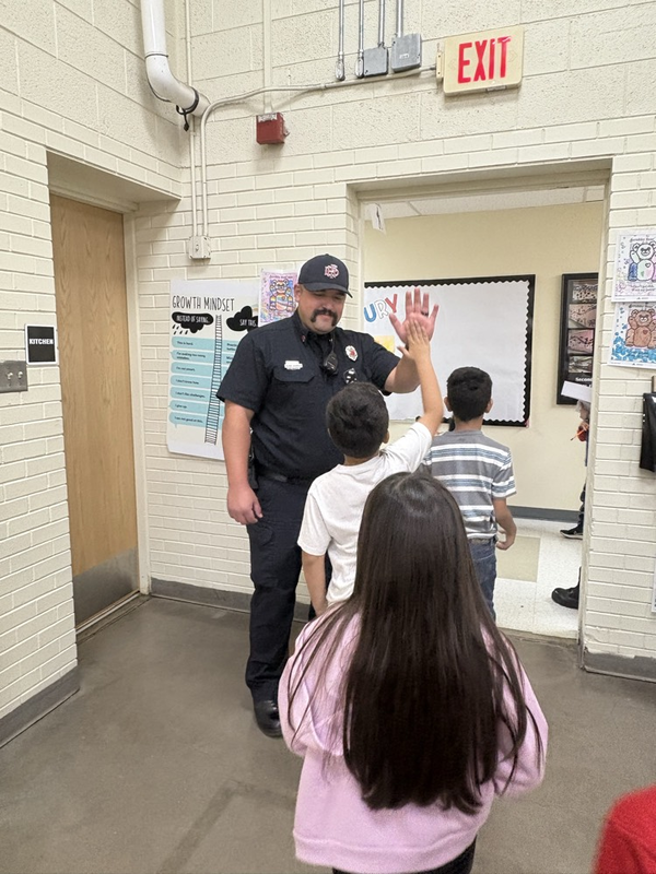 fireman greeting students
