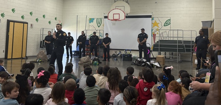 firefighters talking to students