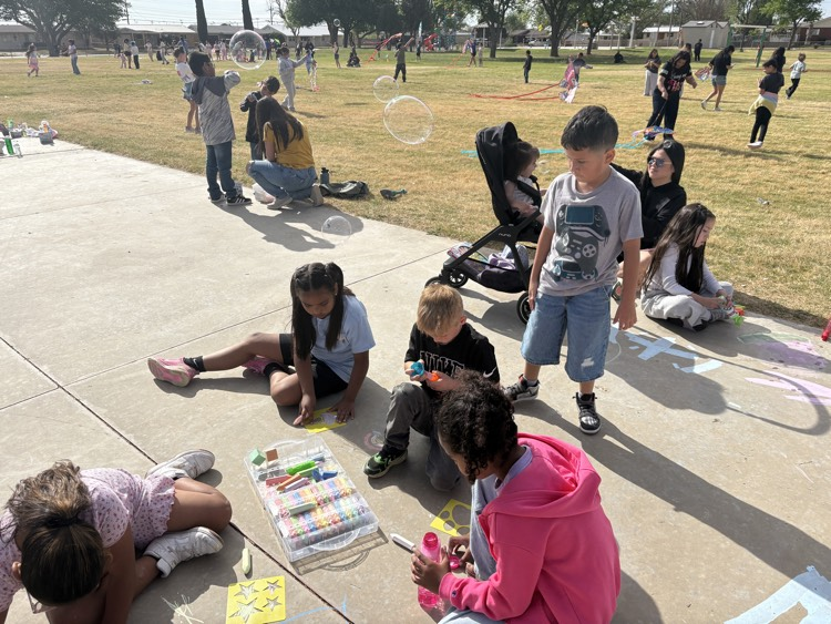 kids drawing with chalk