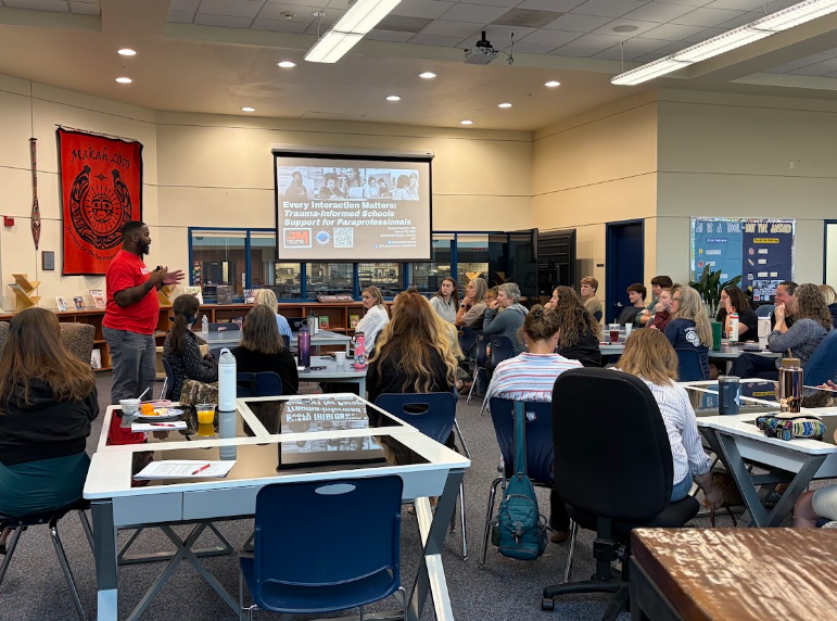 Photo of James Moffett leading a session with HSD paraprofessionals