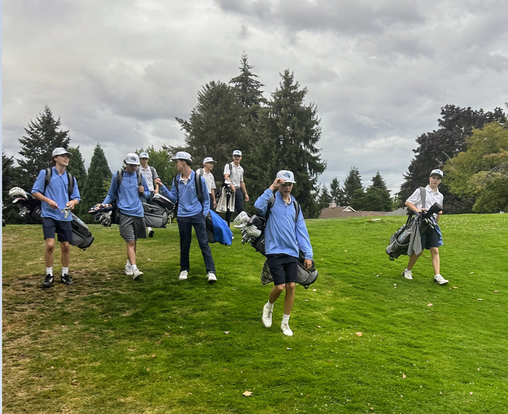 Members of the HHS Golf Team returning from a practice round of golf