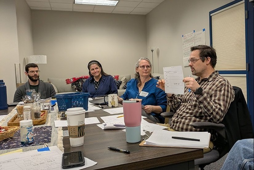 Picture from 2025 HHS Math Team Meeting featuring Kari DeBower 