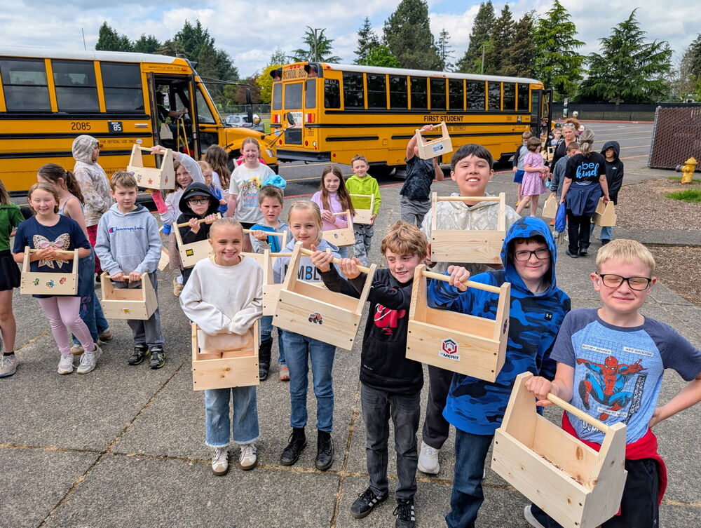 HHES 4th-grade students proudly show off the toolboxes they built with HHS CTE program participants.