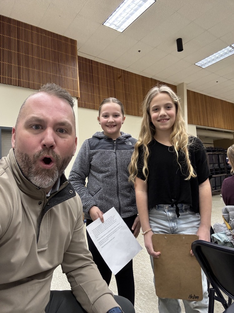 Two HHES 5th graders, assisted by Mr. Olson, present to the Hockinson School Board about campus-happenings.