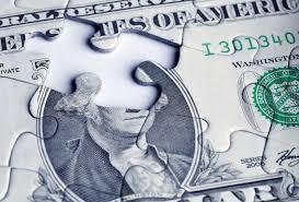 Picture of a dollar bill puzzle with a piece missing