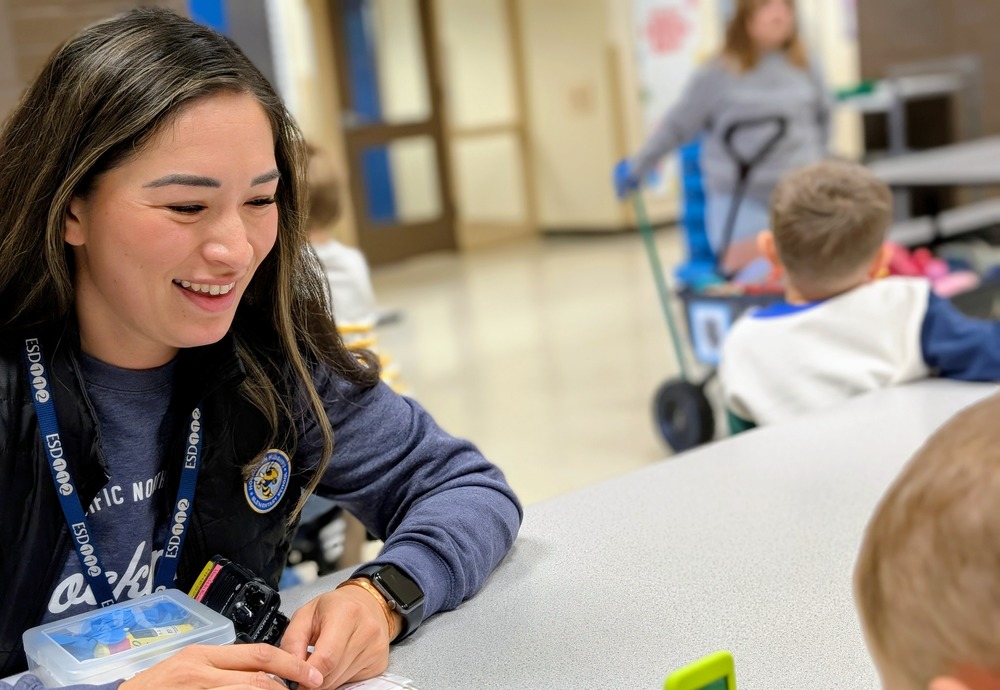 Picture of Nurse Burkhart smiling at student