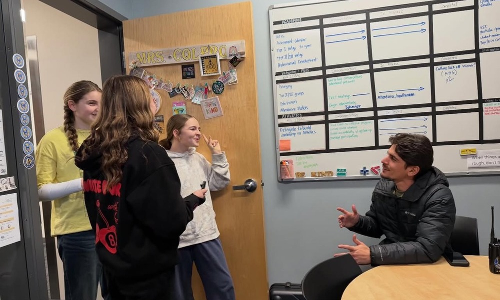 Picture of HMS Leadership students talking to Dean of Students Sid Slom