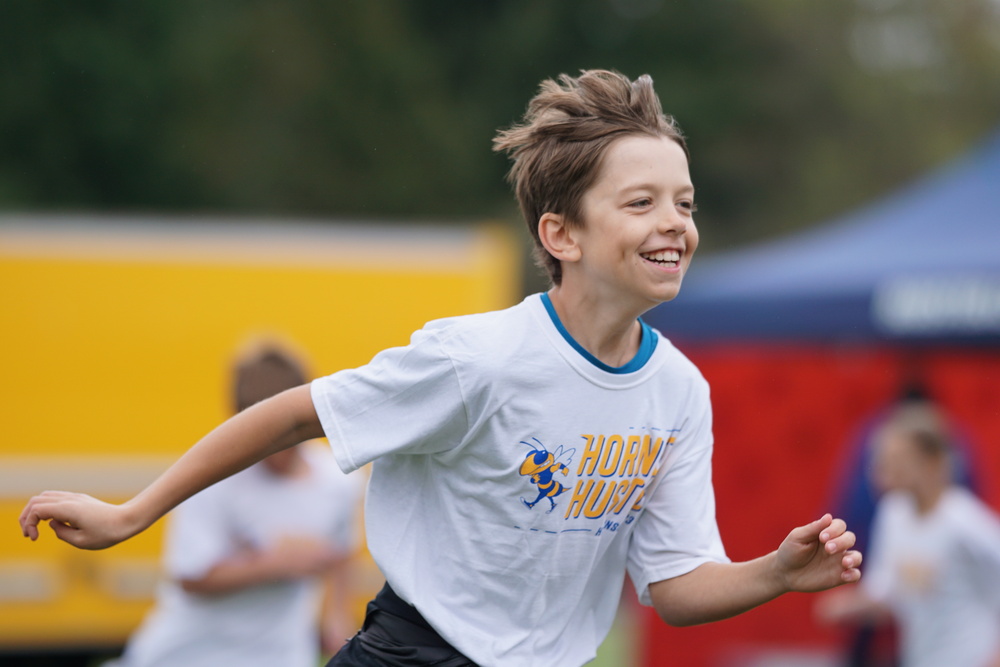 Photo of elementary student running