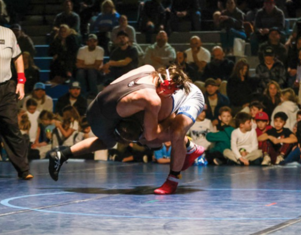 HHS Wrestler in action during the 2024-25 school year.