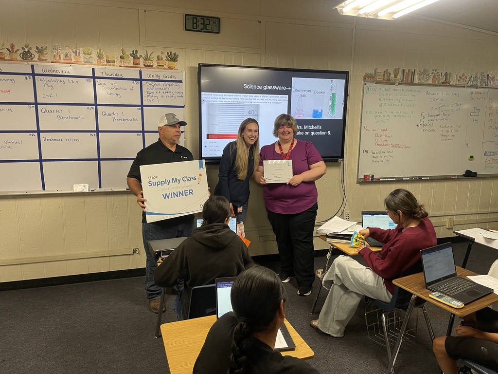 Mrs. Mitchell receives an award from APS called "Supply My Class"