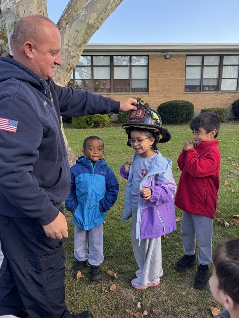 kids by the firetruck
