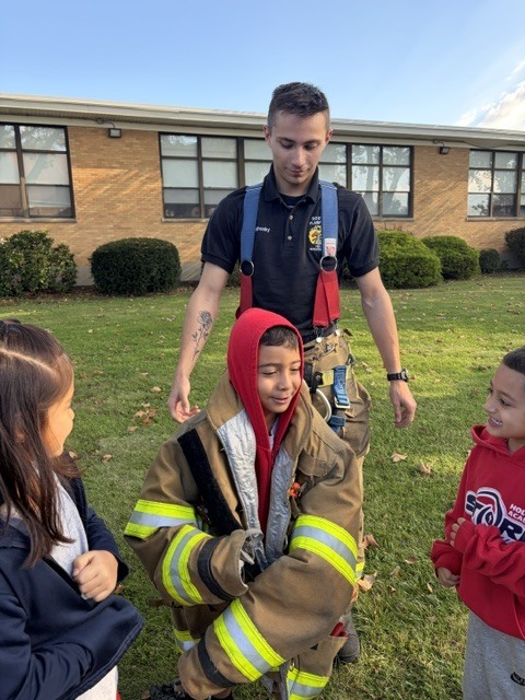 kids by the firetruck
